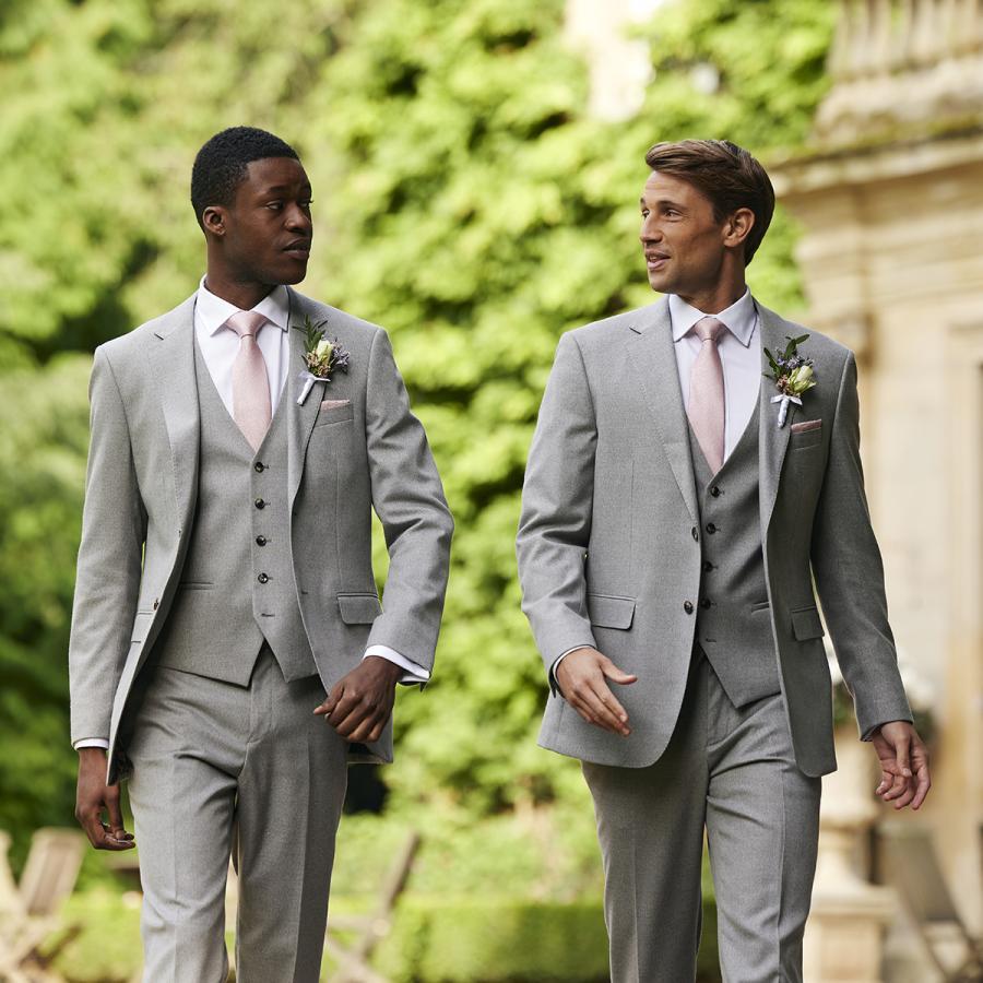 Two men in smart grey wedding suits 